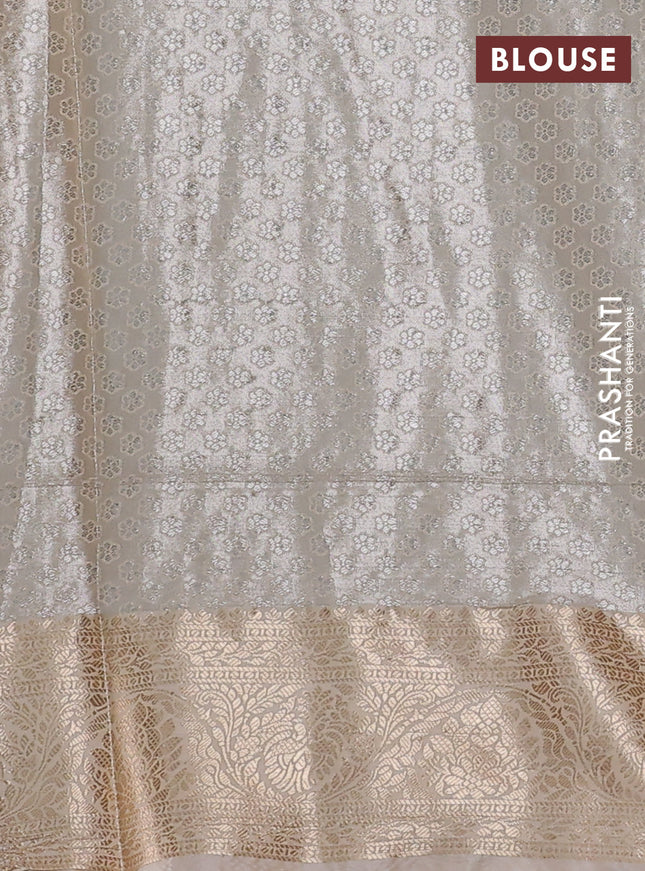 Bangalori tissue silk saree peach shade and sandal with silver zari woven brocade weaves and zari woven border