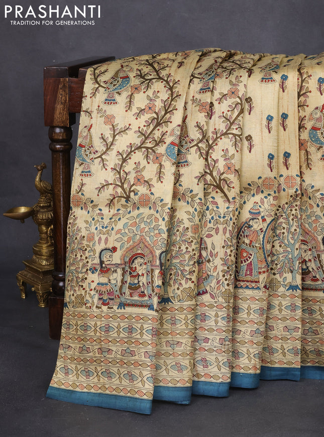 Tussar madhubani printed silk saree cream and blue shade with allover prints and printed border