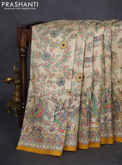 Madhubani printed silk saree cream and mustard yellow with allover prints and printed border