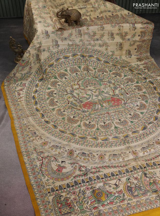 Tussar madhubani printed silk saree cream and mustard yellow with allover prints and printed border