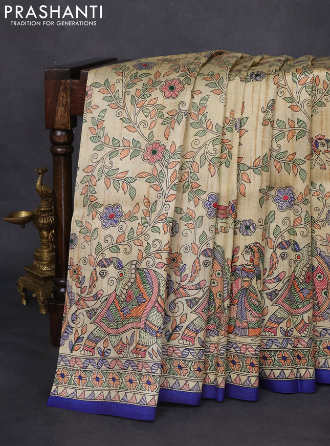 Tussar madhubani printed silk saree cream and blue with allover prints and printed border