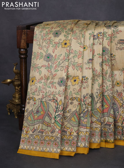 Madhubani printed silk saree cream and mustard yellow with allover prints and printed border