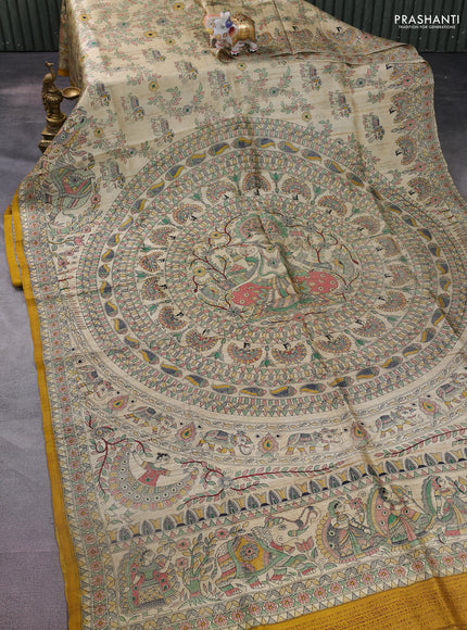 Madhubani printed silk saree cream and mustard yellow with allover prints and printed border