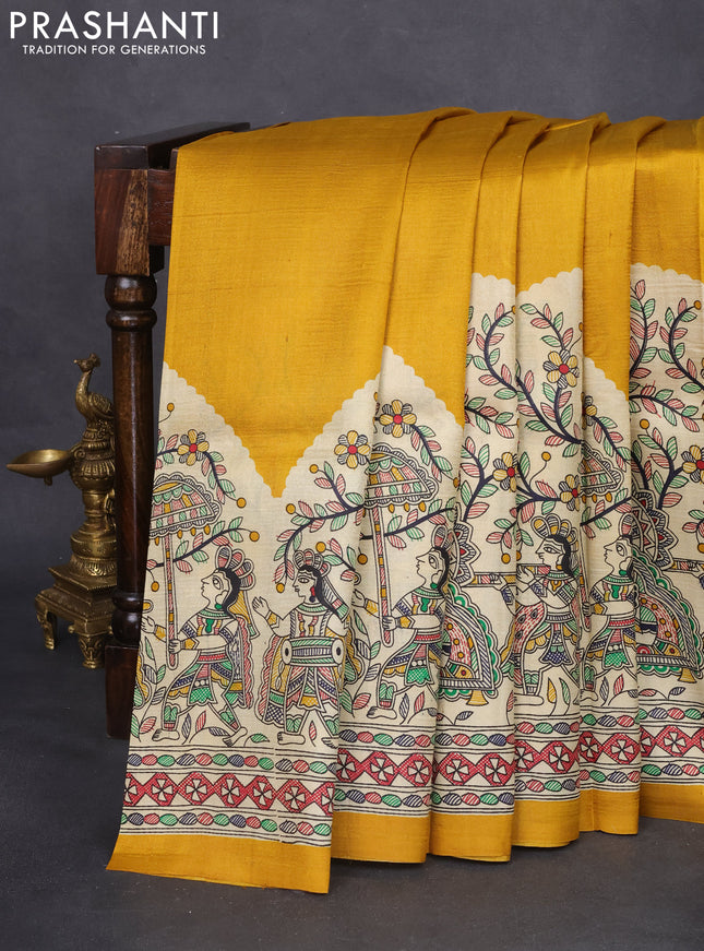 Tussar madhubani printed silk saree mustard yellow and cream with plain body and long printed border