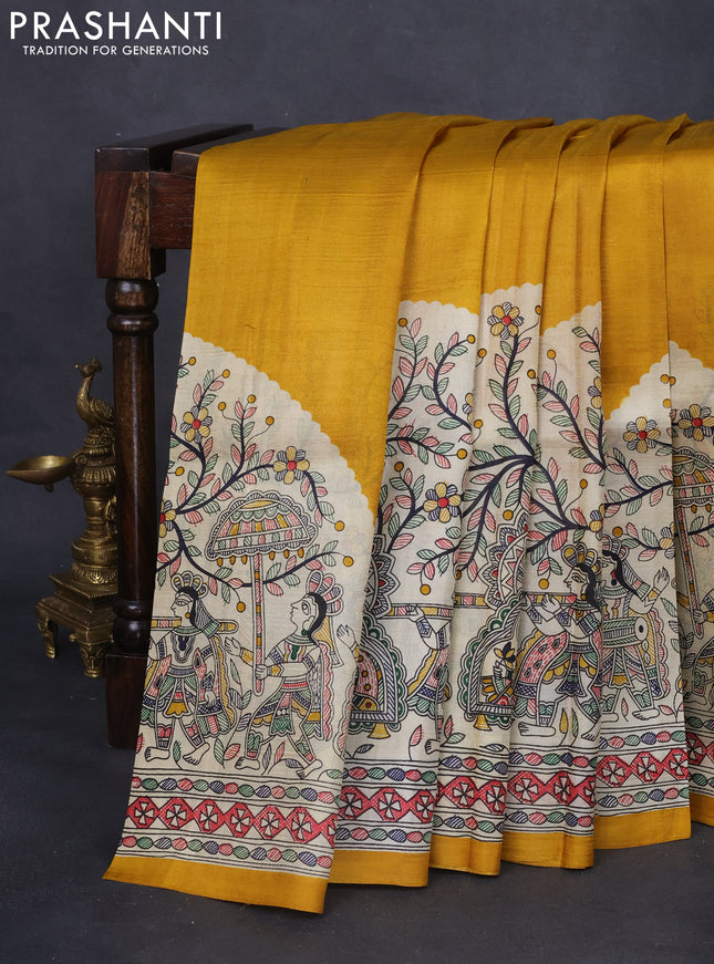 Tussar madhubani printed silk saree mustard yellow and cream with plain body and long printed border