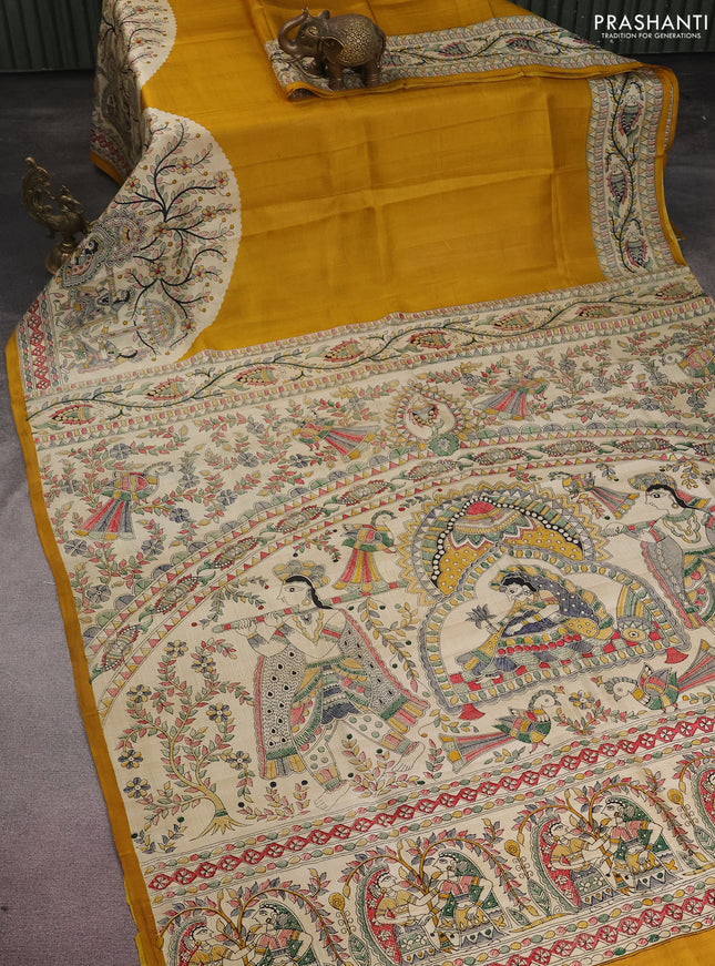 Tussar madhubani printed silk saree mustard yellow and cream with plain body and long printed border