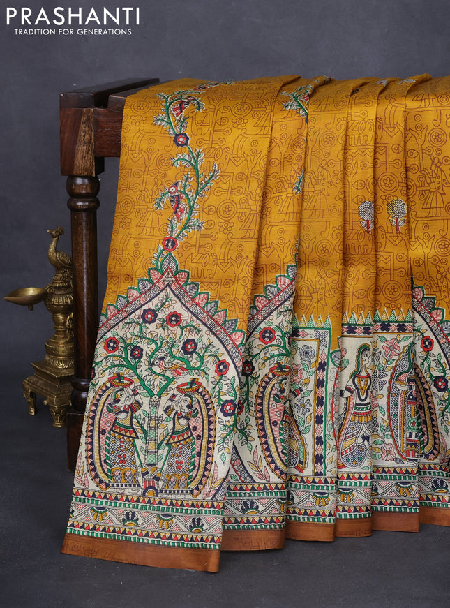 Tussar madhubani printed silk saree mustard yellow and cream with allover prints and printed border