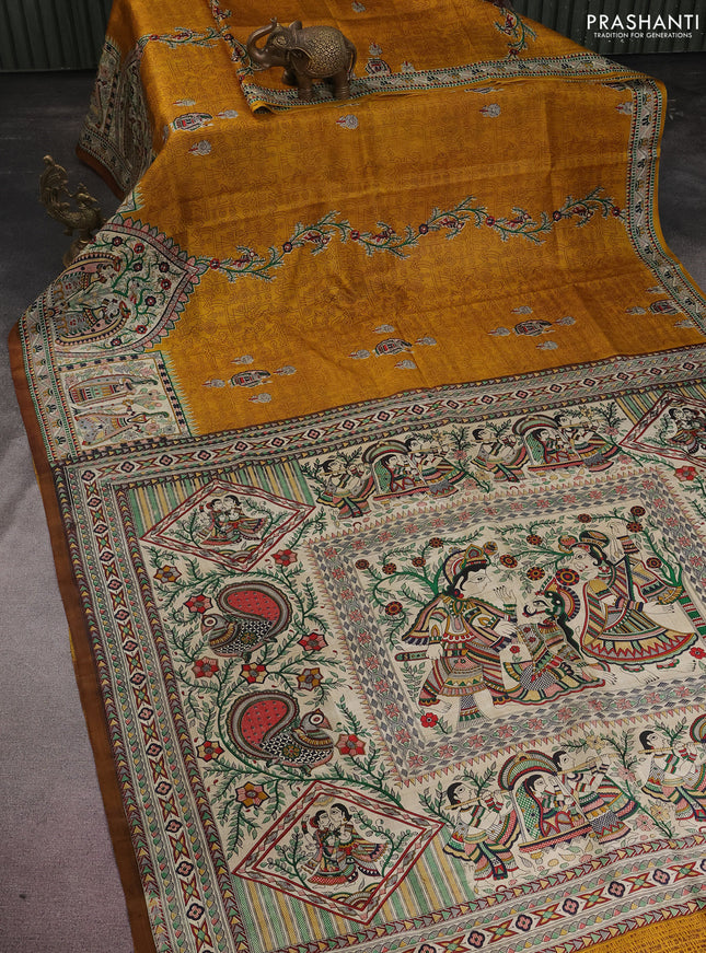 Tussar madhubani printed silk saree mustard yellow and cream with allover prints and printed border