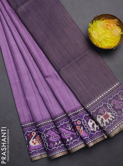 Semi tussar saree mild purple and purple with plain body and patola printed border