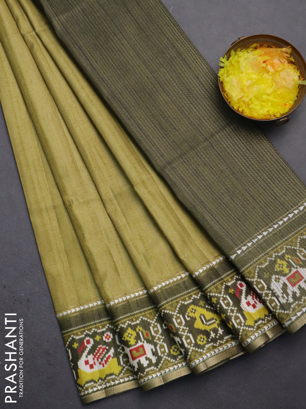 Semi tussar saree light green and sap green with plain body and patola printed border