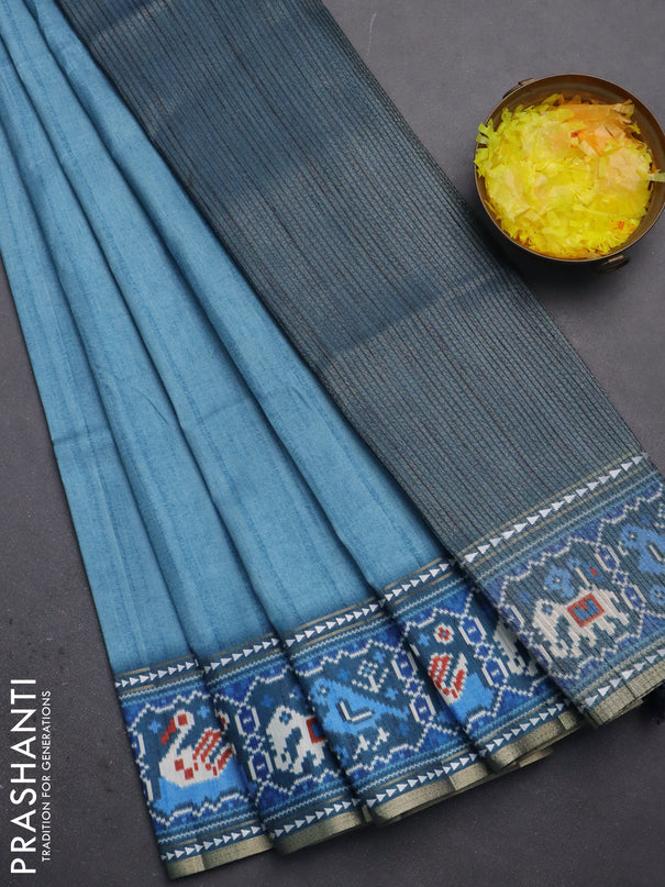 Semi tussar saree teal blue and peacock blue with plain body and patola printed border