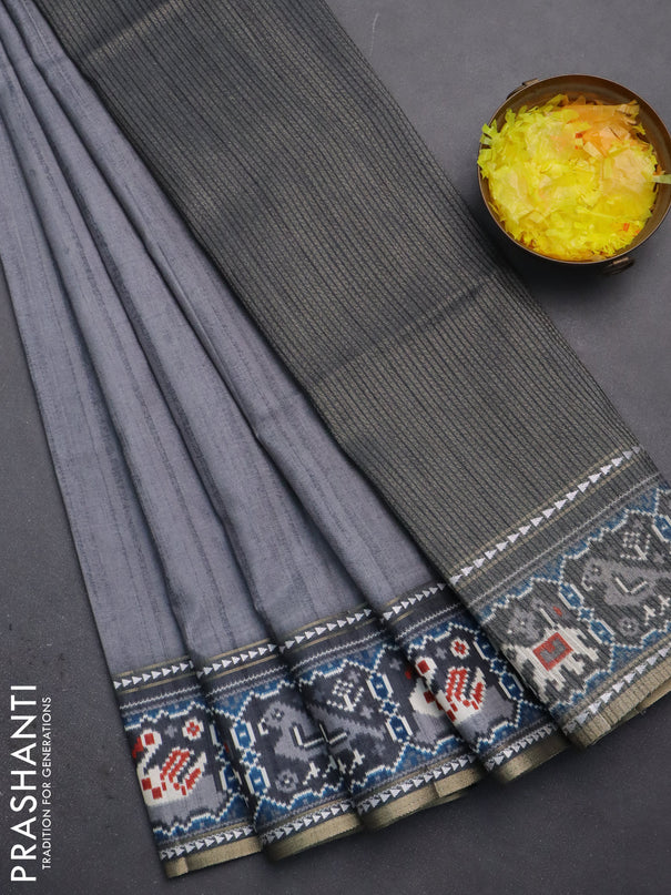 Semi tussar saree grey and dark grey with plain body and patola printed border