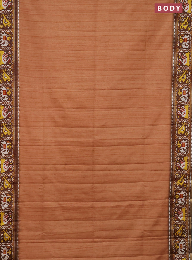 Semi tussar saree peach orange and brown with plain body and patola printed border