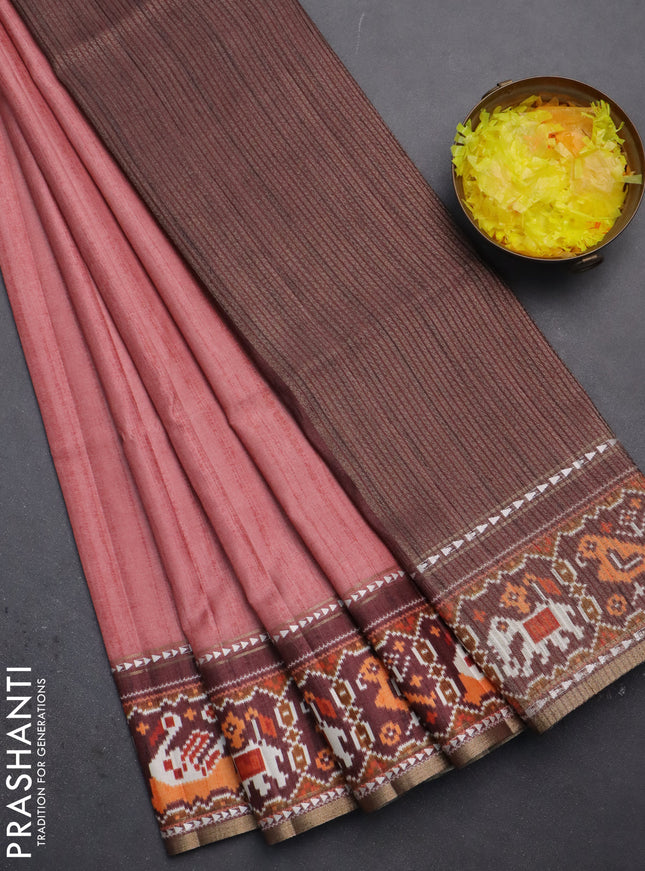 Semi tussar saree dark peach pink and brown with plain body and patola printed border