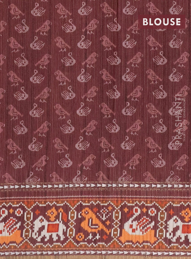 Semi tussar saree dark peach pink and brown with plain body and patola printed border