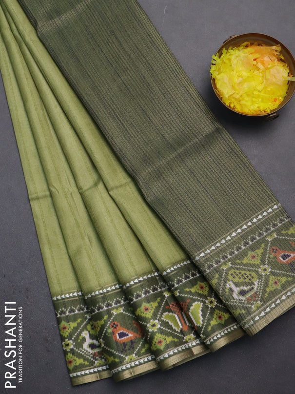 Semi tussar saree light green and sap green with plain body and patola printed border