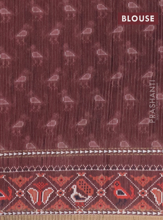 Semi tussar saree dark peach and brown with plain body and patola printed border