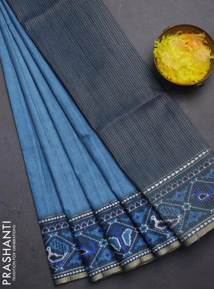 Semi tussar saree blue shade and peacock blue with plain body and patola printed border