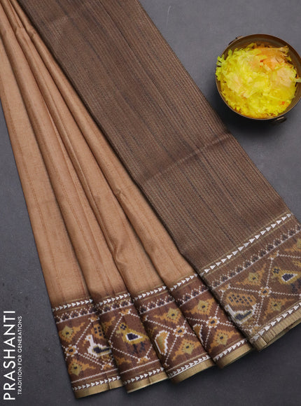 Semi tussar saree sandal and brown with plain body and patola printed border