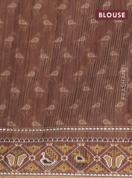 Semi tussar saree sandal and brown with plain body and patola printed border