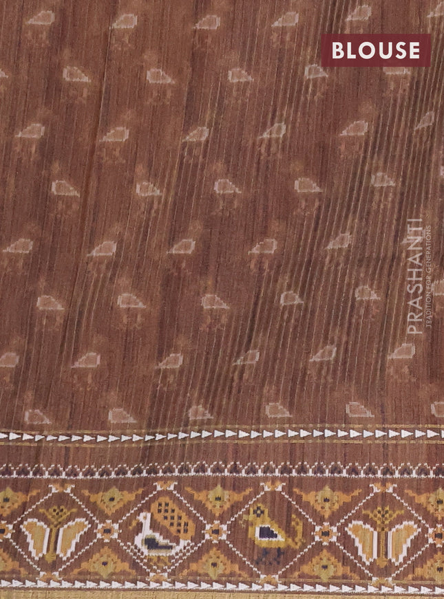 Semi tussar saree sandal and brown with plain body and patola printed border