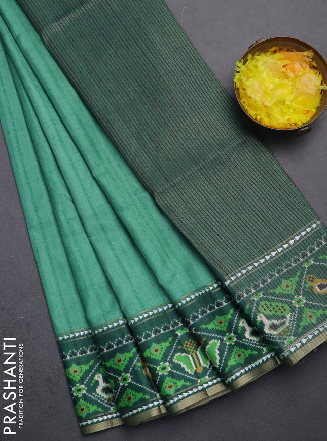 Semi tussar saree teal green and green with plain body and patola printed border