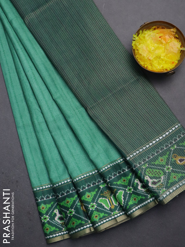 Semi tussar saree teal green and green with plain body and patola printed border