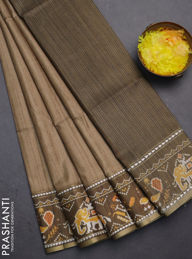 Semi tussar saree elaichi green and sap green with plain body and patola printed border