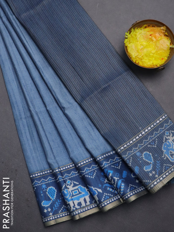 Semi tussar saree blue shade and blue with plain body and patola printed border