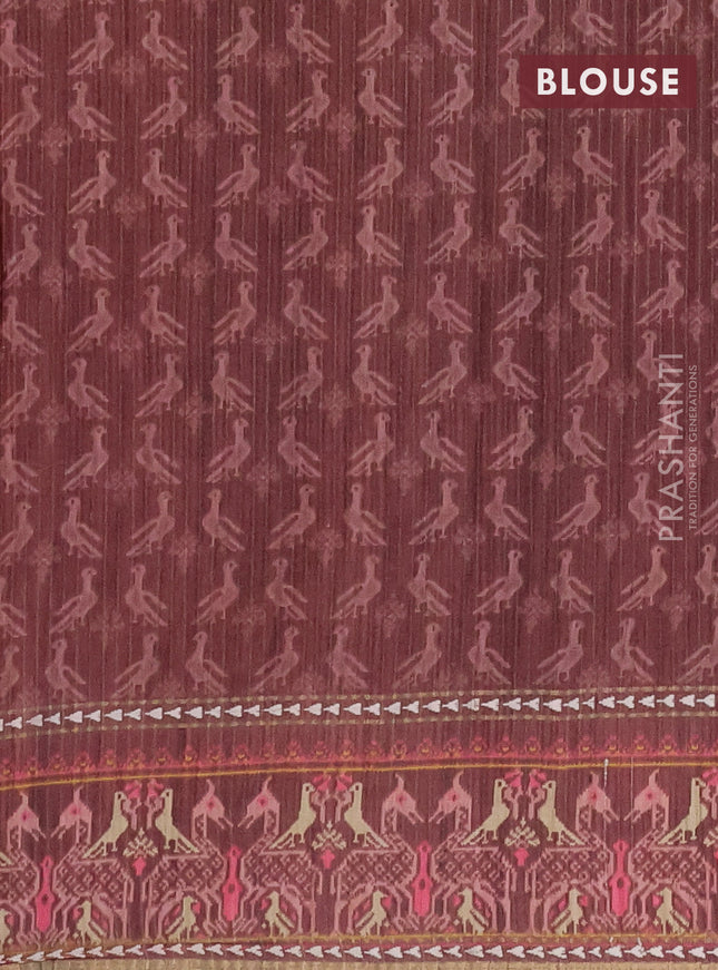Semi tussar saree pastel peach and brown with plain body and patola printed border