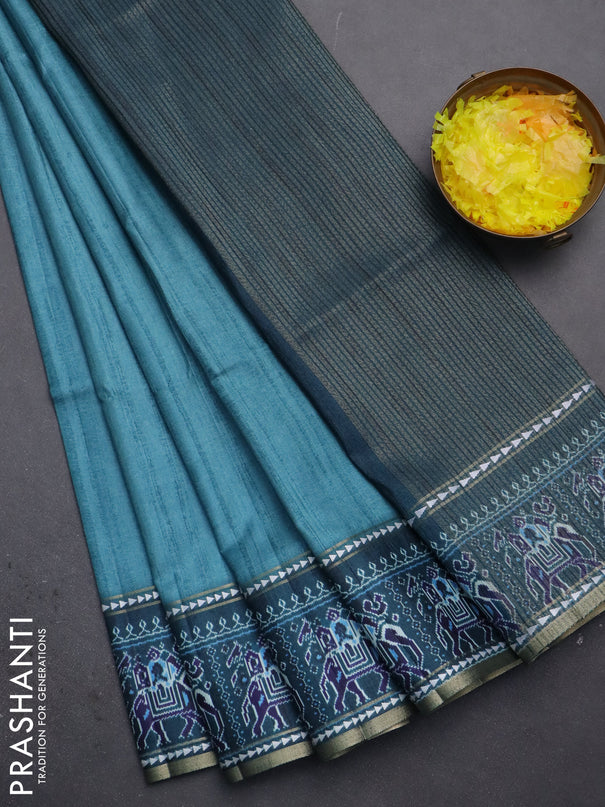 Semi tussar saree teal blue and peacock blue with plain body and patola printed border