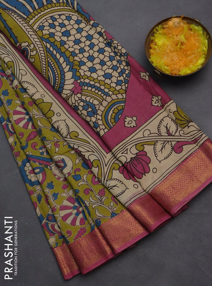 Kalamkari semi silk saree light green and pink with allover prints and zari woven border