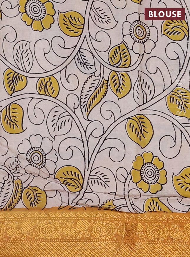 Kalamkari semi silk saree blue and dark mustard with allover prints and zari woven border