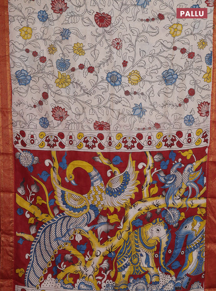 Kalamkari semi silk saree beige and rust shade with allover prints and zari woven border
