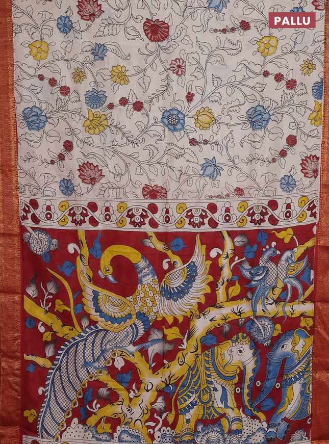 Kalamkari semi silk saree beige and rust shade with allover prints and zari woven border