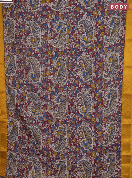 Kalamkari semi silk saree maroon and mustard yellow with allover prints and zari woven border