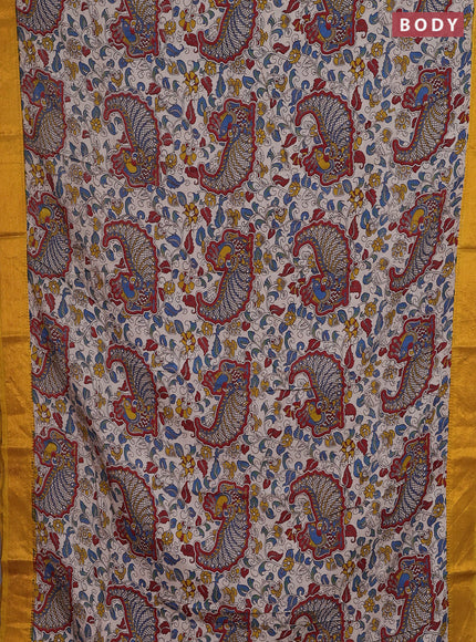 Kalamkari semi silk saree beige and mustard yellow with allover prints and zari woven border