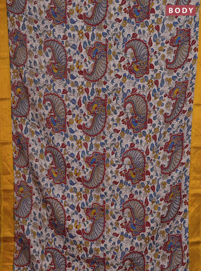 Kalamkari semi silk saree beige and mustard yellow with allover prints and zari woven border