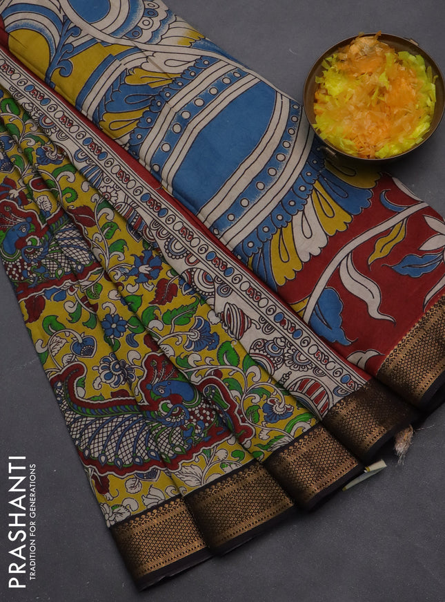 Kalamkari semi silk saree yellow and black with allover prints and zari woven border
