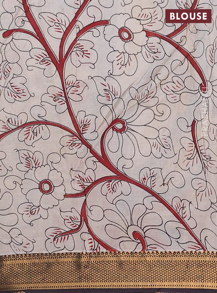 Kalamkari semi silk saree yellow and black with allover prints and zari woven border