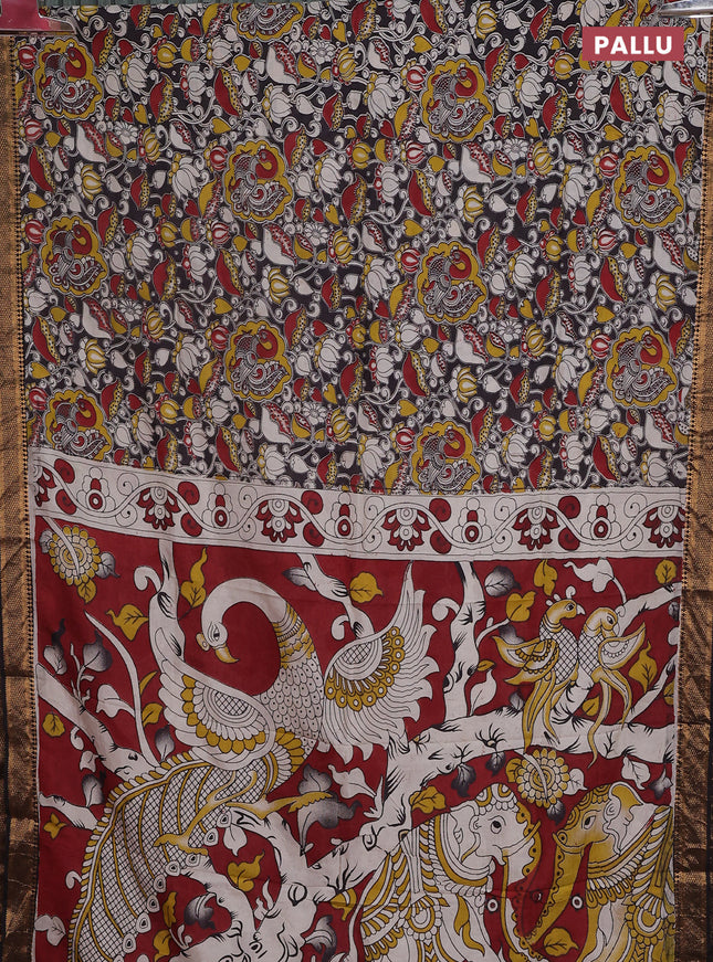 Kalamkari semi silk saree black with allover prints and zari woven border