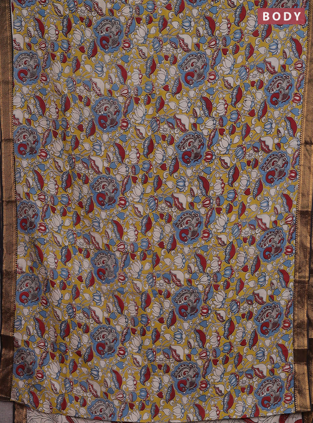 Kalamkari semi silk saree yellow and black with allover prints and zari woven border