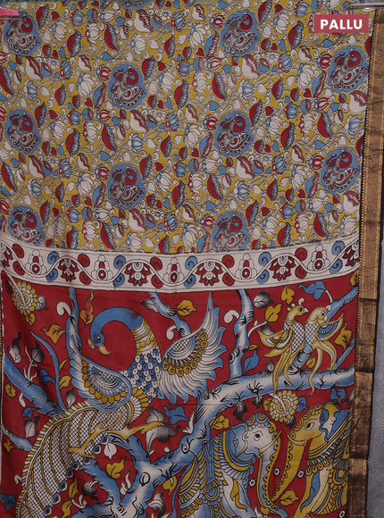 Kalamkari semi silk saree yellow and black with allover prints and zari woven border