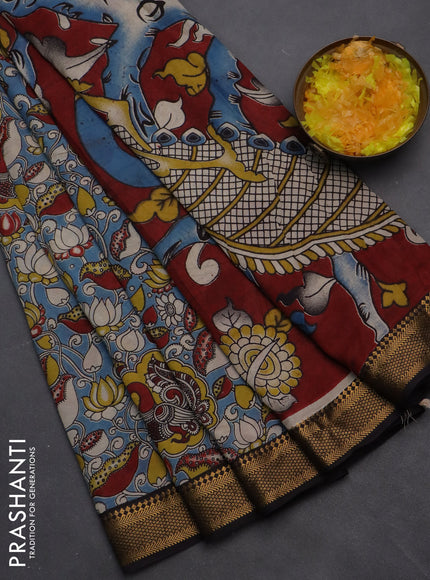 Kalamkari semi silk saree pastel blue and black with allover prints and zari woven border