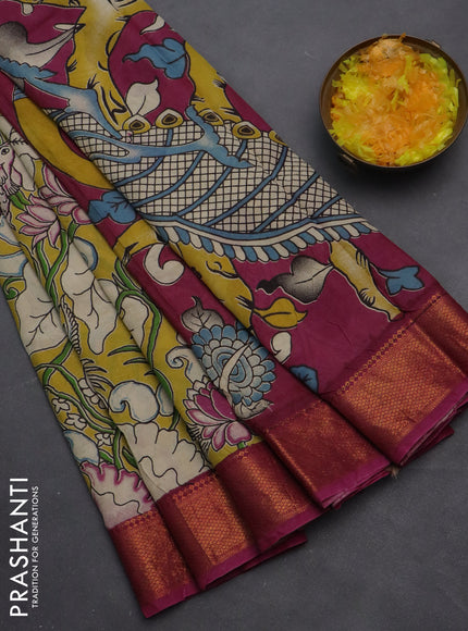 Kalamkari semi silk saree yellow and magenta pink with allover prints and zari woven border