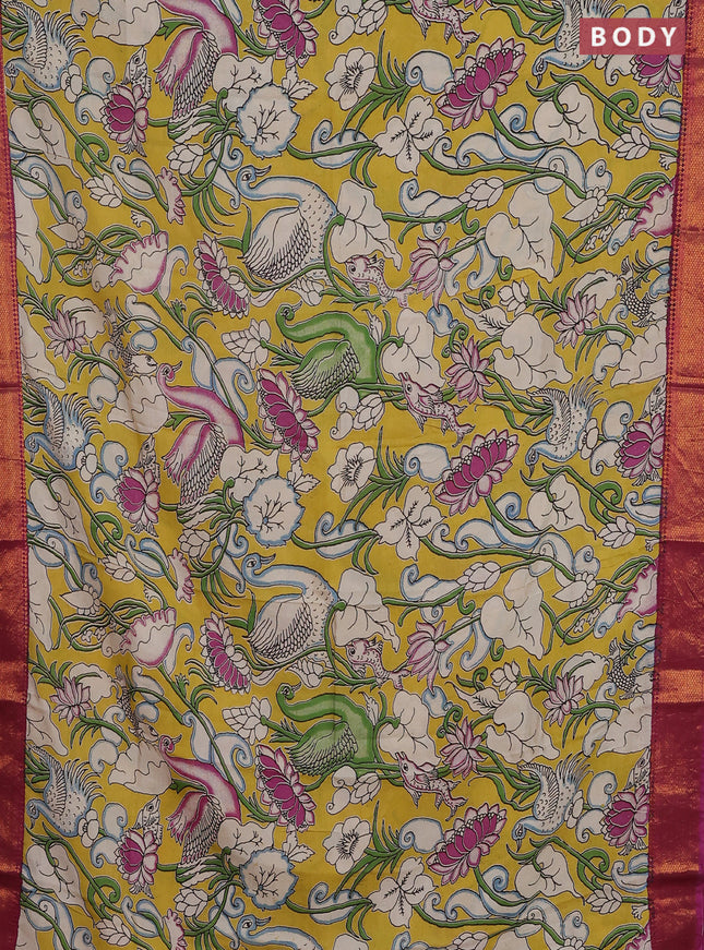 Kalamkari semi silk saree yellow and magenta pink with allover prints and zari woven border