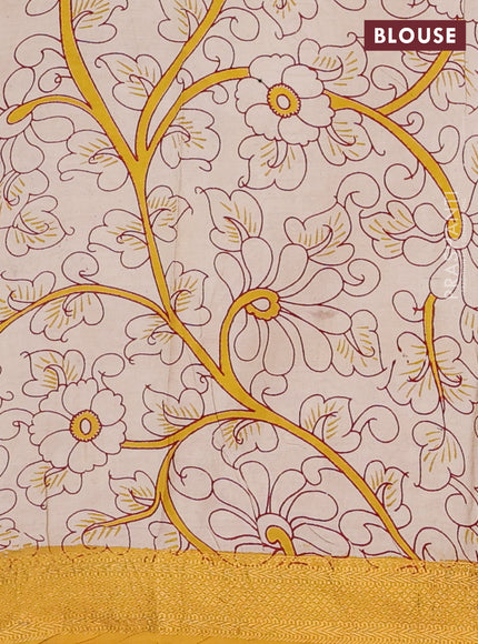 Kalamkari semi silk saree maroon and mustard yellow with allover prints and zari woven border
