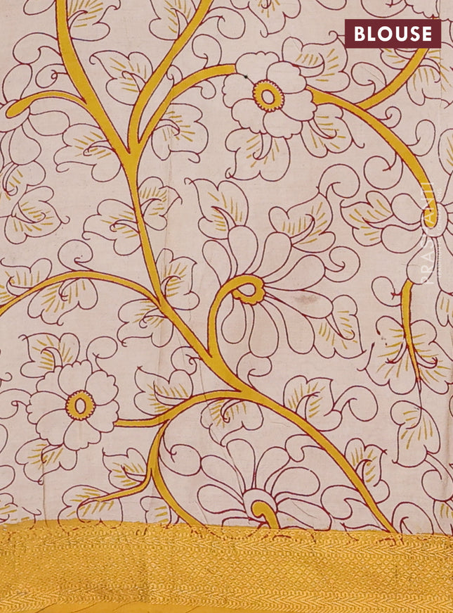 Kalamkari semi silk saree maroon and mustard yellow with allover prints and zari woven border