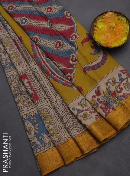 Kalamkari semi silk saree multi colour and mustard yellow with allover prints and zari woven border