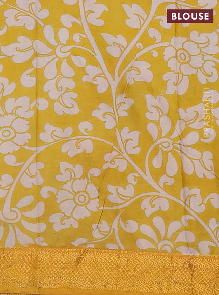 Kalamkari semi silk saree multi colour and mustard yellow with allover prints and zari woven border